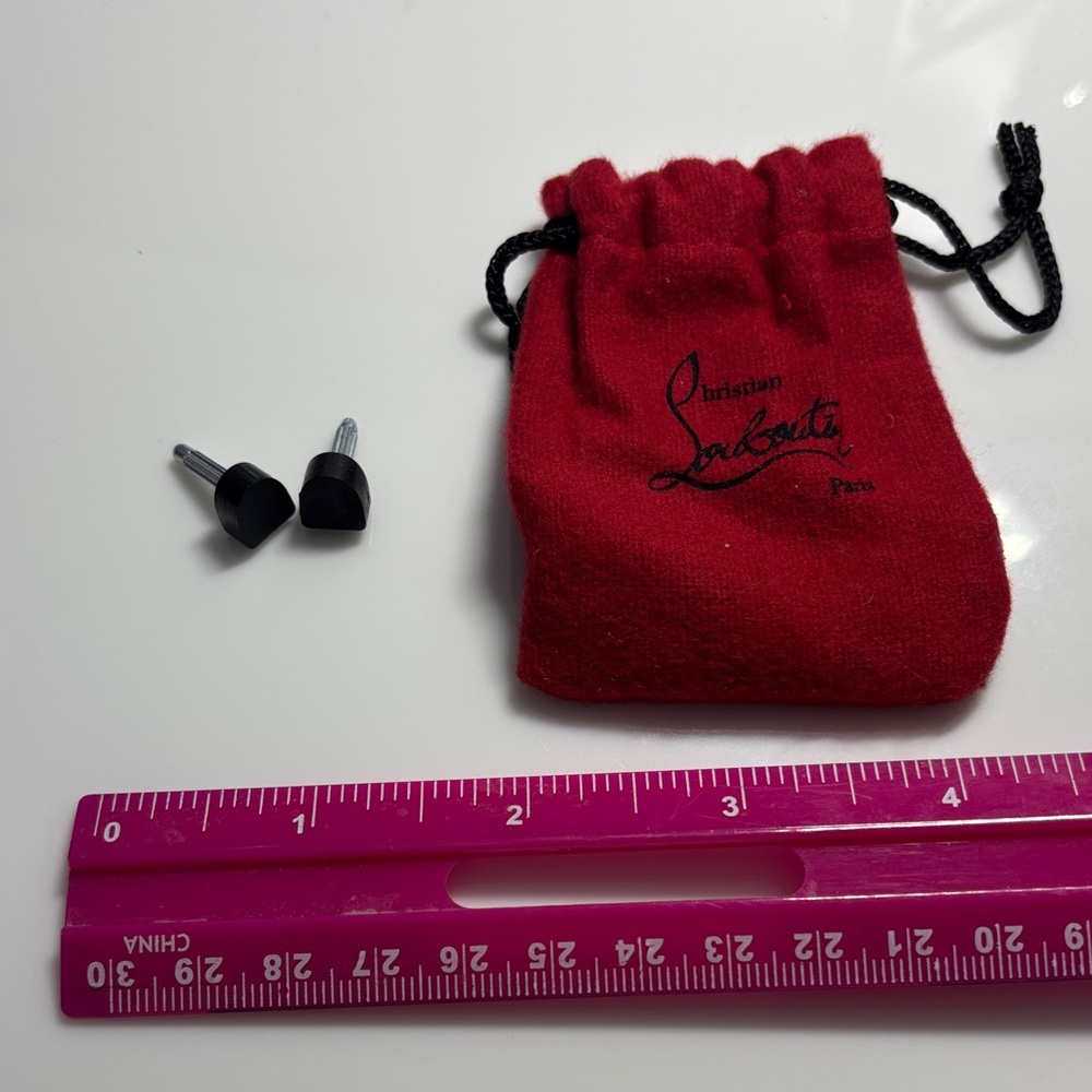 Christian Louboutin replacement heel tap with Pouch with Black Logo